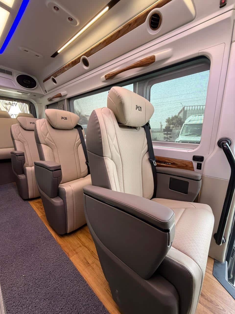 Force Urbania interior seating Varanasi — push-back recliner rows